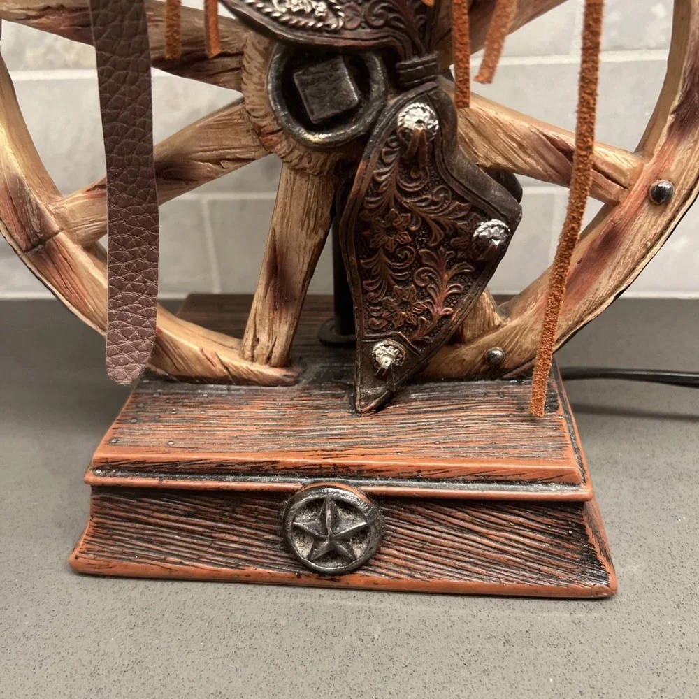 Western vintage Saddle Lamp rope on the saddle, sitting on a wheel/NO LAMP SHADE
